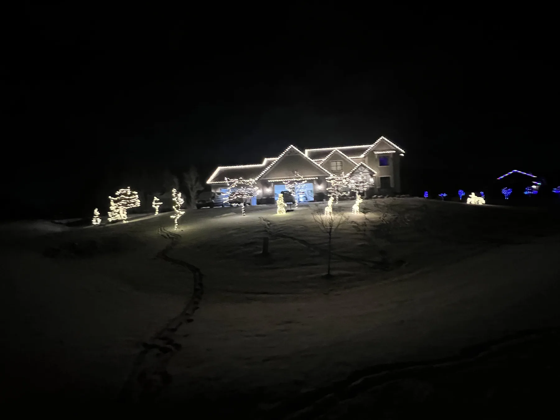 Professional holiday lighting installation on a Wisconsin property